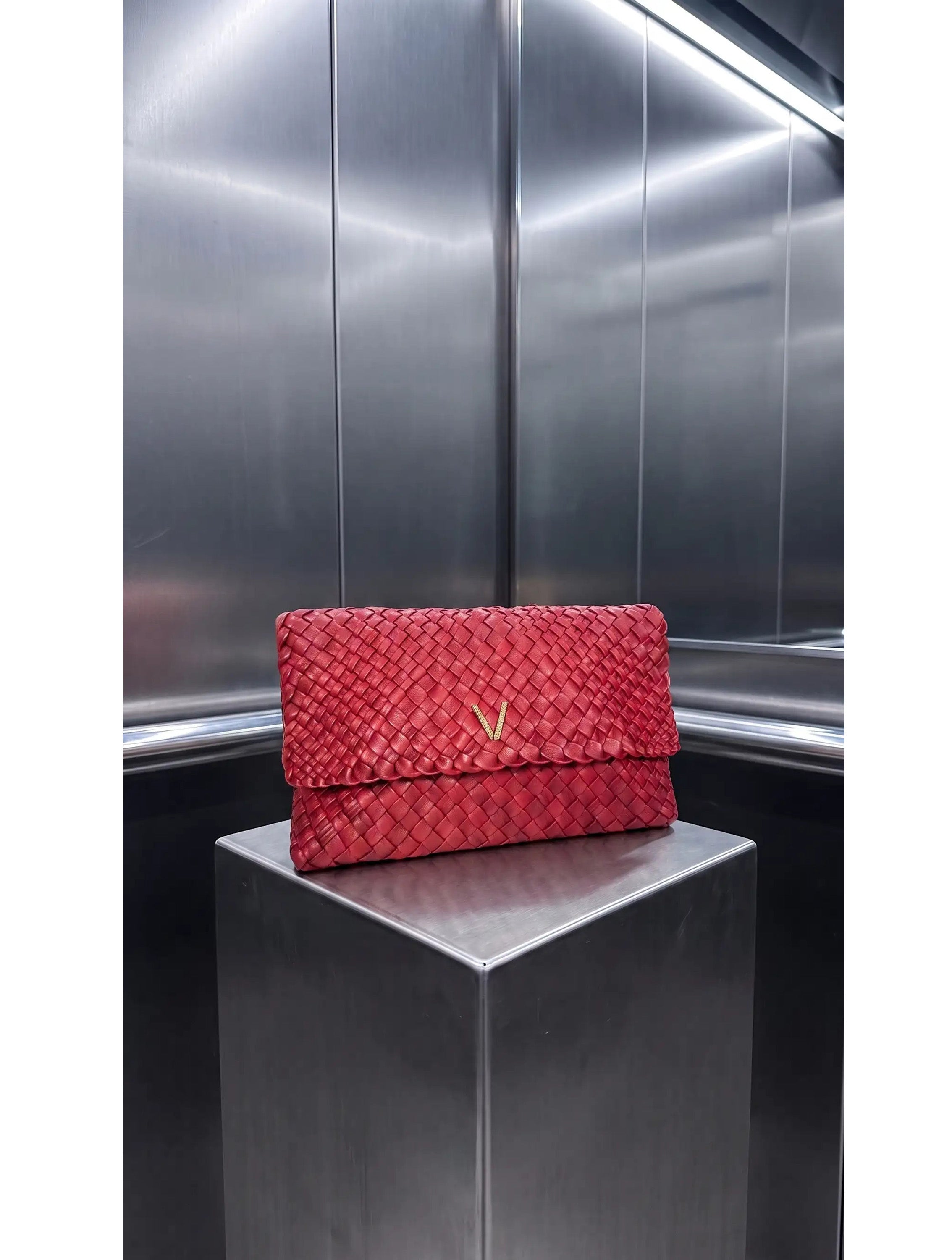 MADISON V BRAIDED BI CLUTCH